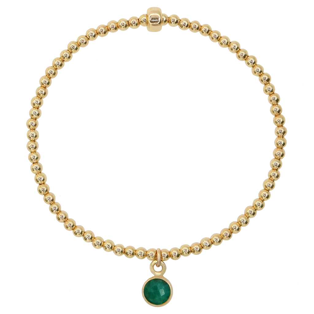 Gold filled 2.5mm beaded stretch bracelet with 6mm emerald charm encased in gold over sterling silver