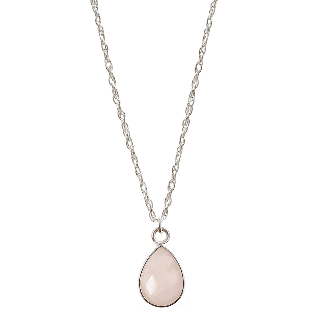 Faceted rose quartz teardrop shaped gemstone encased in sterling silver hanging from sterling silver rope chain; shown on white background